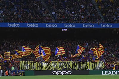 Barcelona supporters express pro-catalan political ideals at the Camp Nou
