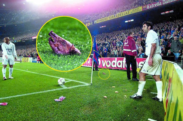 Luis Figo has objects hurled at him in his first El Clasico for Madrid as he lines up to take a corner kick