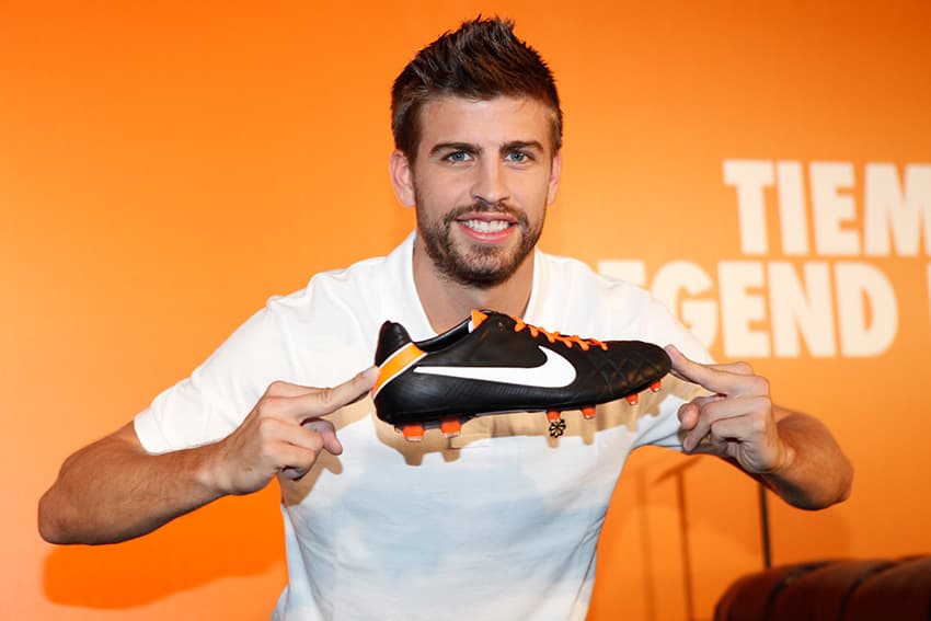 Gerard Pique uses his, erm, fingers, to show off the Tiempo